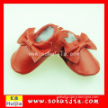 The new design style red big bow cow leather moccasins soft flat fashion shoes for baby
